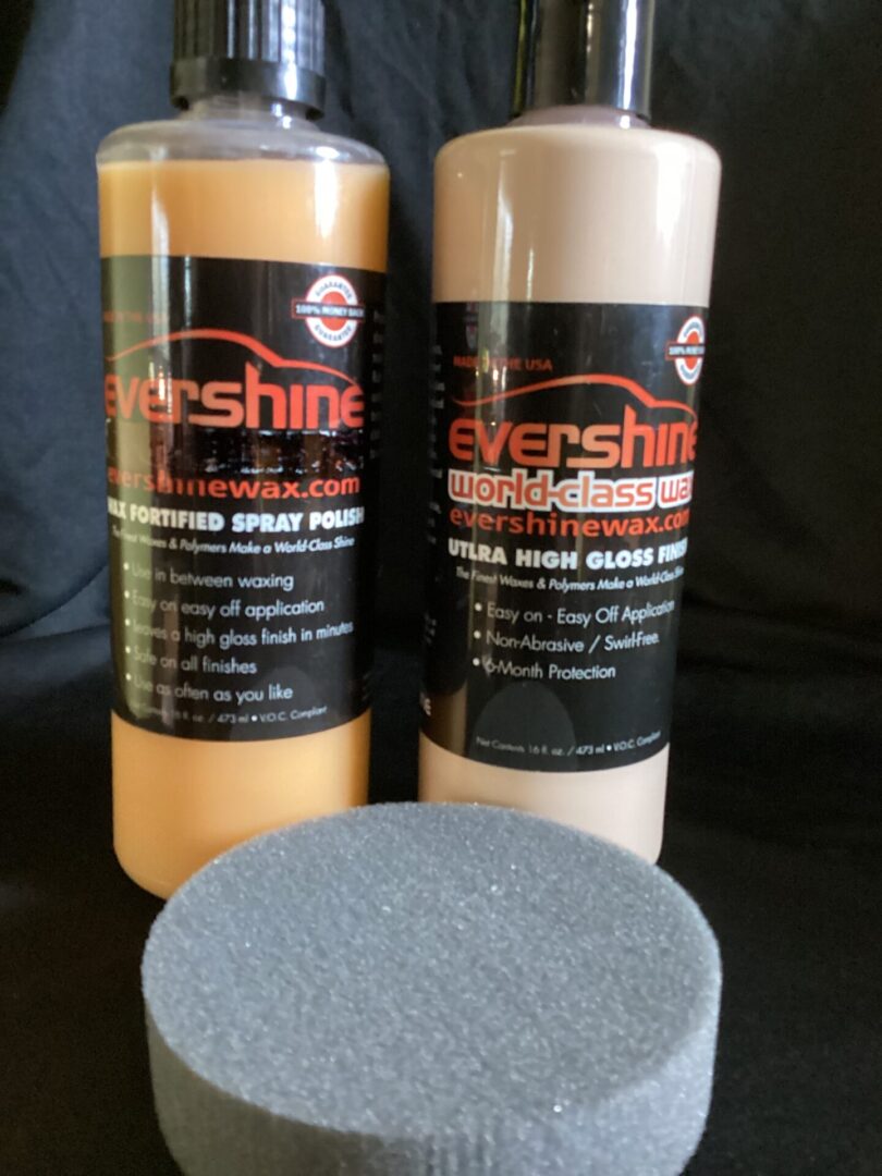 Two Evershine wax sprays with a sponge