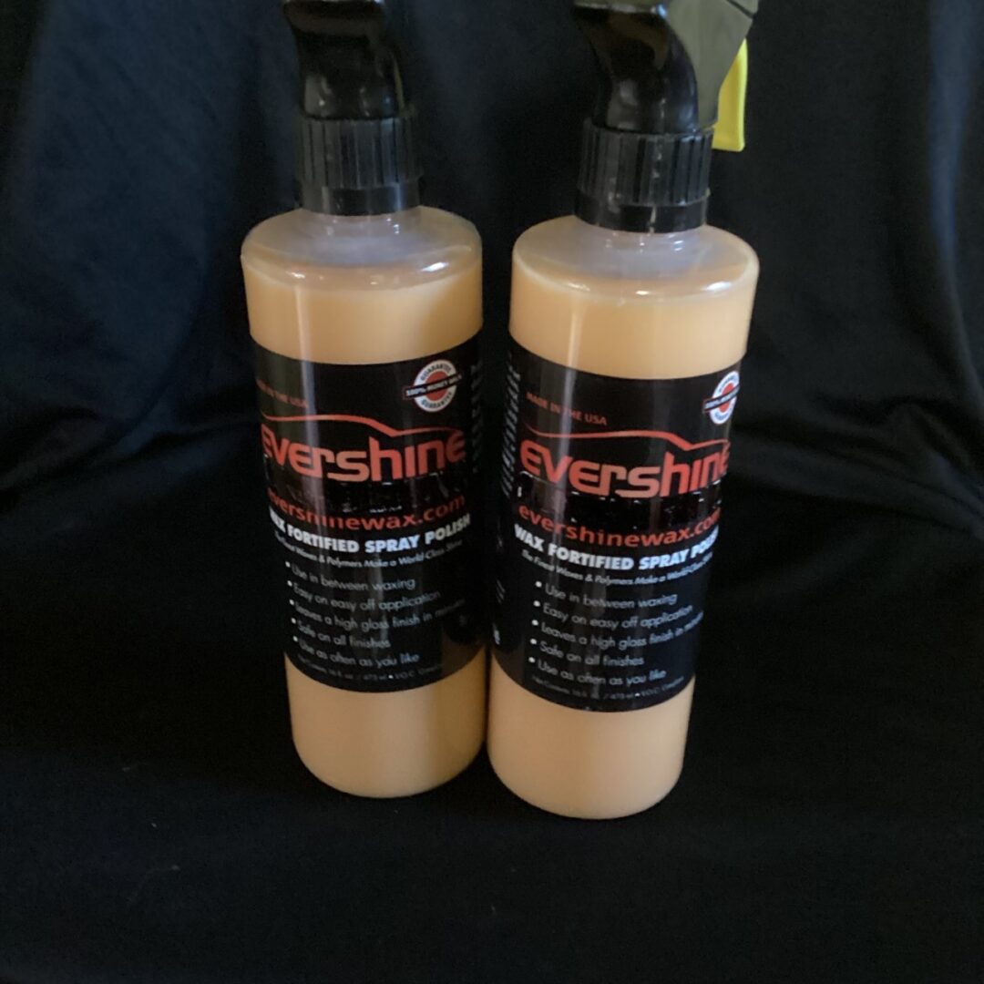 Two Evershine wax sprays placed on a chair